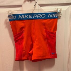 Nike Pro Bright Orange Shorts with Blue Waistband